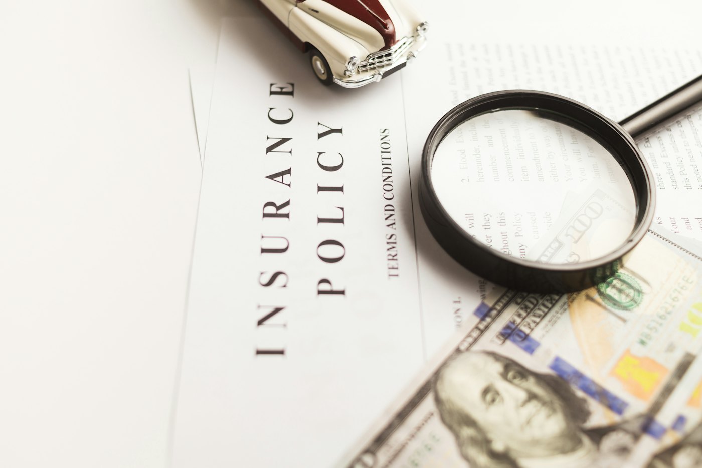 A magnifying glass resting on top of a printed document